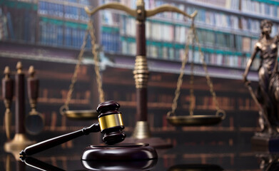 Law theme. Court library - gavel of the judge and books.