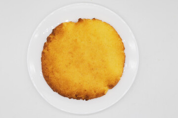 Large Traditional Latin American Corn Cookie on a White Plate