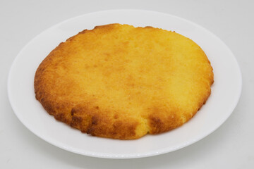 Large Traditional Latin American Corn Cookie on a White Plate