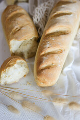 A real French baguette with a crisp crust prepared at home.