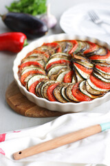Ratatouille with eggplant, zucchini and tomatoes in a fragrant sauce. A healthy and delicious dish.