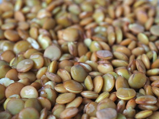 Lentil seeds. Background with lentil seeds. Healthy diet and lifestyle
