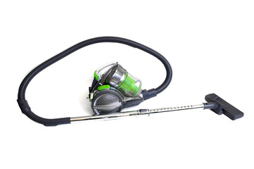 Green vacuum cleaner isolated on white background