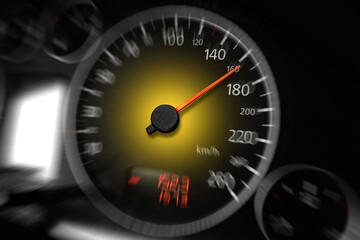 The speedometer of a modern car shows a high driving speed.