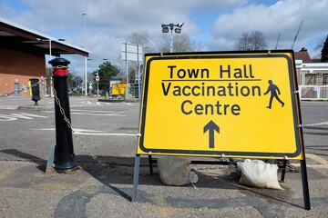 Covid-19 Town Hall Vaccination Centre direction sign