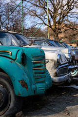 Old Soviet retro cars in the open air. Dump of a car of the Soviet era.