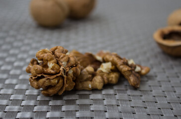 Peeled walnut on the background of the shell