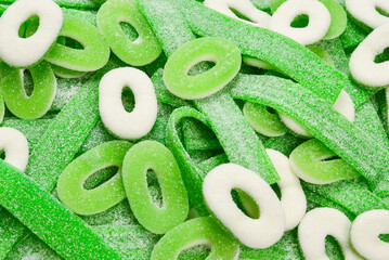 Assorted green gummy candies background. Top view. Jelly  sweets.