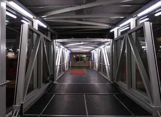 Gangway leading from the terminal in Turku Finland to the carferry going to Stockholm Sweden - 422103749