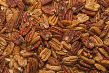 Tasty pecan-nut background. Top view.