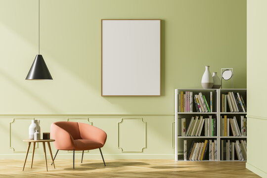 Bright waiting room interior with bookcase, armchair and empty poster