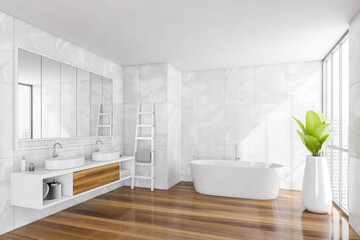 Obraz na płótnie Canvas Bathroom interior. Two sinks with mirrors, bathtub and plant on wooden floor