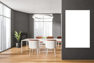 Grey wooden dining room interior with furniture near window, poster