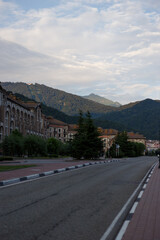 Beautiful sunset view of the mountains. City in the mountains, view of the houses and mountains. The Golden Hour