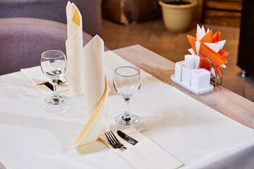 Cafe or restaurant interior and table settings