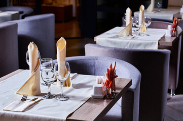 Cafe or restaurant interior and table settings