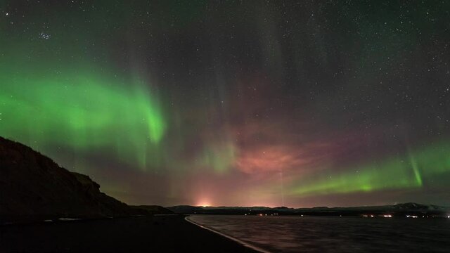 Northern lights moving fast across the sky in Iceland - time lapse video
