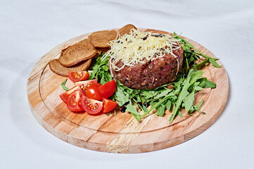 Beef cutlet with salad, cheese and bread