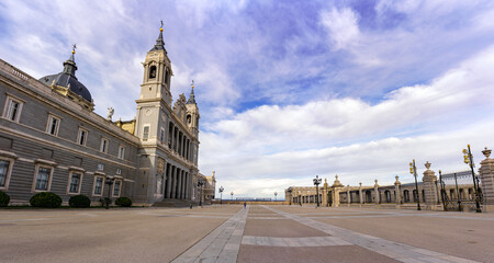 Fototapeta premium Esplanade of the Almudena cathedral in Madrid with blue sky at sunrise.