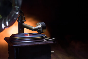 Old gramophone on a dark background. Music concept