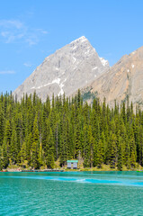 Mountain Lake with Blue Sky and White Clouds in Canada.