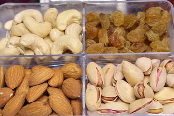 Silver Tray with mixed dried fruits on white Background