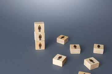 Figurine block tower with people. Hierarchical system. Company organization. Hiring, recruiting....