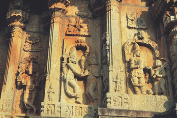 Avatars of Lord Vishnu on the wall of a Hindu temple in Sringeri. Stone sculptures of Varaha,...