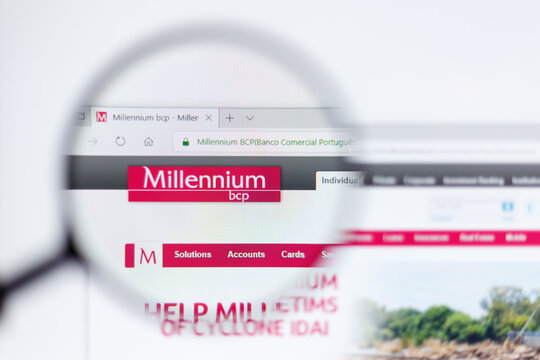 Moscow / Russia - 04.08.2019:  Banco Comercial Portugues logo on the official website homepage. Banco Comercial Portugues logo visible on monitor screen through a magnifying glass