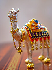 Beautiful souvenir camel figurine standing on the table