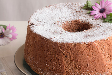 chiffon cake with chocolate and flowers 