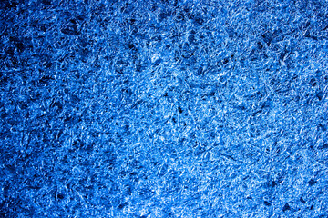 Abstract glazed background. Blue frozen water. Close up of iced water.