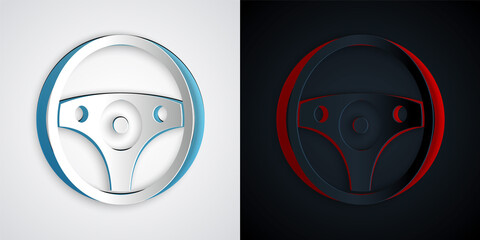 Paper cut Steering wheel icon isolated on grey and black background. Car wheel icon. Paper art style. Vector