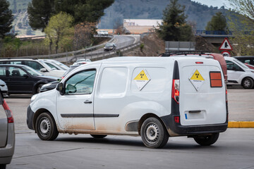 Van with radioactive hazard labels, signs included in the European agreement for the transport of dangerous goods by road (ADR)