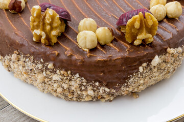 Meringue cake, covered with chocolate