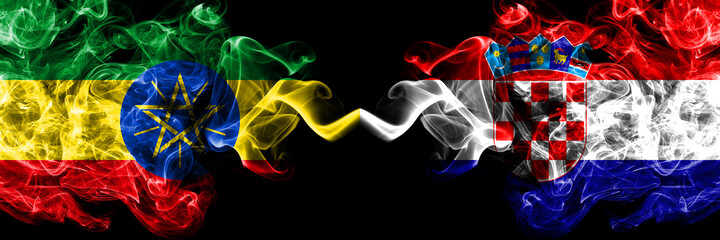 Ethiopia, Ethiopian vs Croatia, Croatian smoky mystic flags placed side by side. Thick colored silky abstract smoke flags.