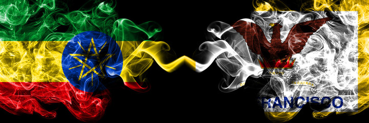 Ethiopia, Ethiopian vs United States of America, America, US, USA, American, San Francisco, California smoky mystic flags placed side by side. Thick colored silky abstract smoke flags.
