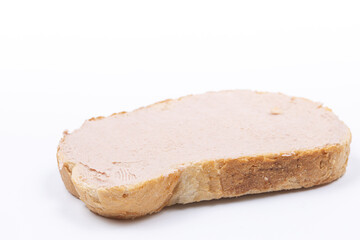 Sliced of bread with pate isolated above white background