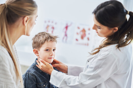 Little boy having medical examination by pediatrician