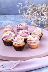 Mini cupcakes with Buttercream Icing. Easter cupcakes decorated with candy sprinkles.