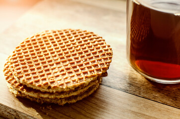 Delicious waffles with tea. Close-up.
