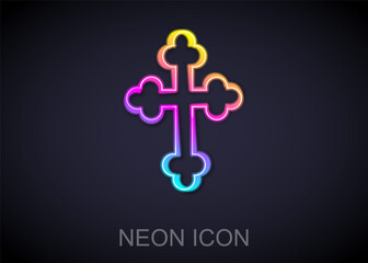 Glowing neon line Christian cross icon isolated on black background. Church cross. Vector