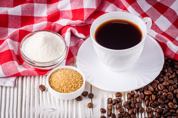 cup of fragrant fresh coffee on a white wooden rustic background