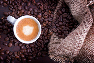 cup of coffee with beans