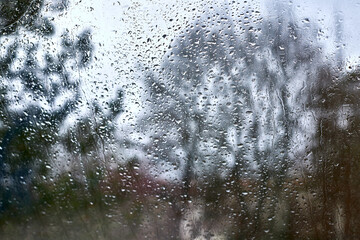 Sprink raindrops on a blurred window