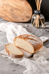 Homemade sourdough bread on rustic background