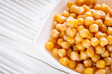 boiled chickpeas on a white wooden rustic background