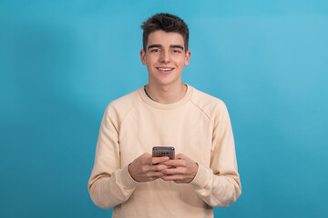 teenager boy or student with mobile phone isolated on background