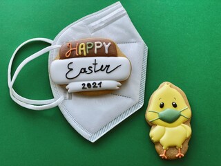 happy easter greeting card with face protective mask to prevent coronavirus pandemic