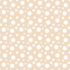 Colorful seamless dot pattern with pastel orange background 